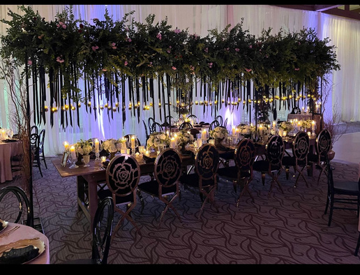 Greenery runner above reception table
